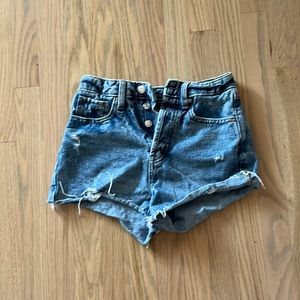 Cute dark blue slightly ripped jean shorts